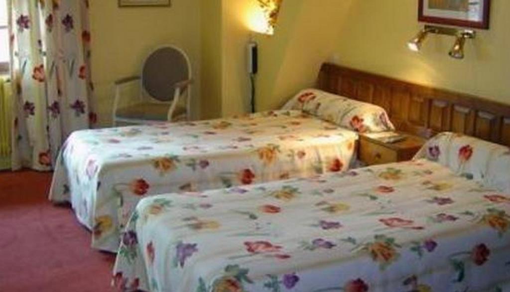 Отель Le Ratelier Montaigut-sur-Save Номер фото