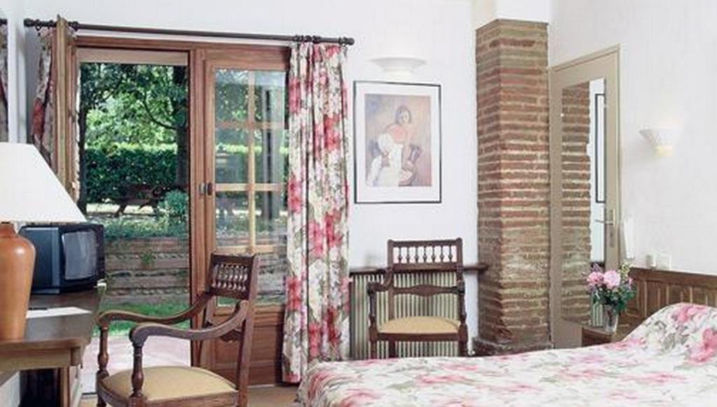 Отель Le Ratelier Montaigut-sur-Save Номер фото